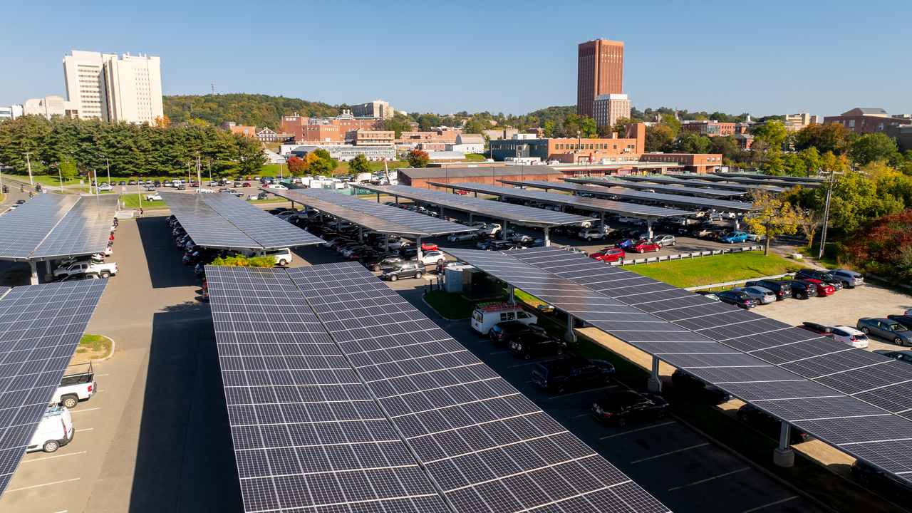 The Lot 25 solar arrays with campus in the background